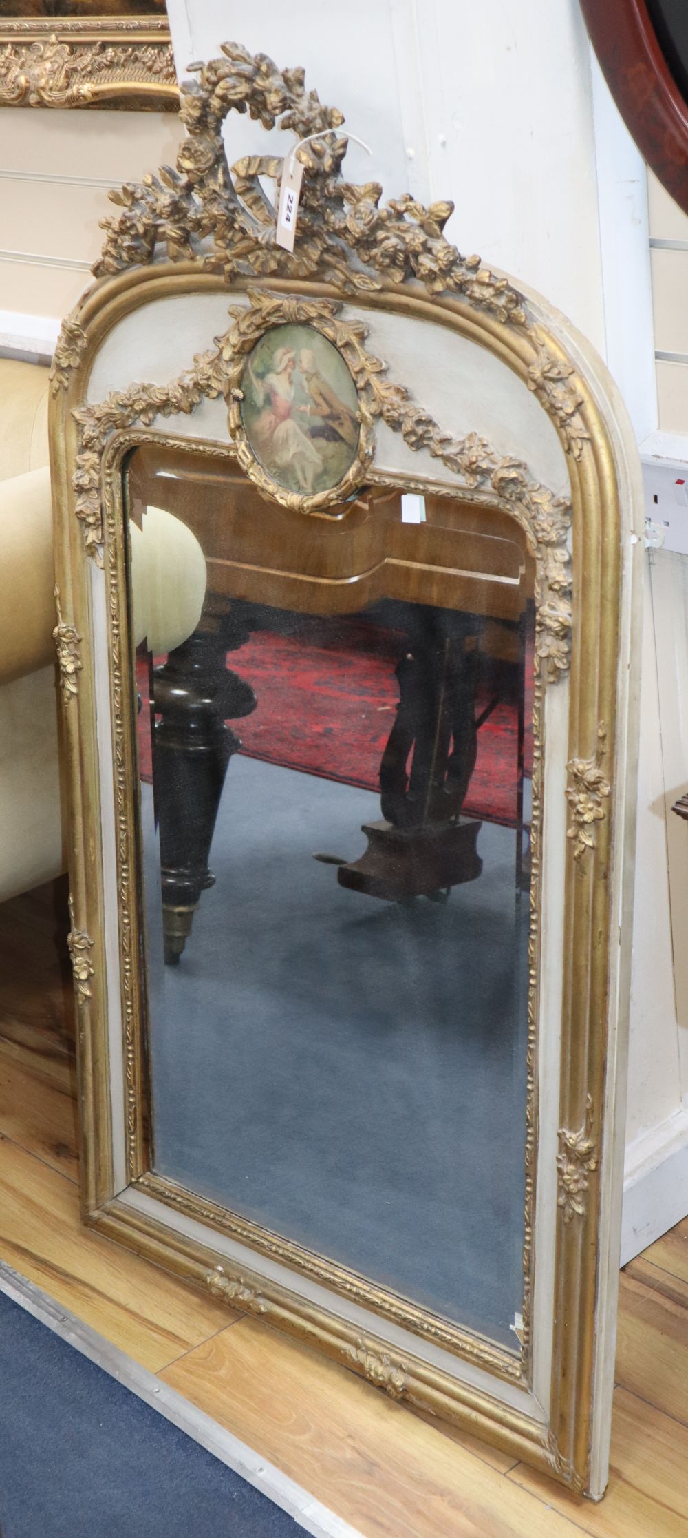 An Edwardian gilt gesso wall mirror, W.72cm, H.126cm